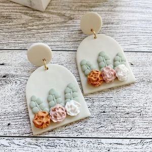 Pink, green and cream colored floral design polymer clay earrings dangle earring